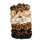 Oh, these are not the regular beauty supply store scrunchies. Our Large & Plush Hair Scrunchies, are made from luxurious silk and satin. They are the perfect blend of style and functionality, ensuring your hair looks fabulous while being cared for.

Benefits

1. Gentle on Hair: Scrafted to minimize breakage and damage, making them perfect for all hair types, including natural textures. Say goodbye to harsh hair ties that snag and pull!

2. Chic & Versatile: Available in a range of trendy colors and patterns
